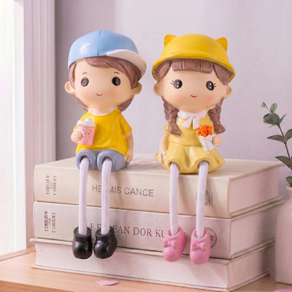 Kiss & Bouquet Gift Set Decorative Showpiece |Gift for him/her or Someone Special | Polyresin Couple Wearing Cute Caps Hanging Legs Showpiece - 2 Pcs Set