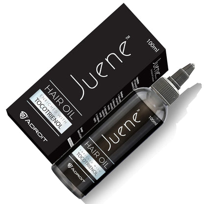Juene hair oil bottle and packaging on a white background