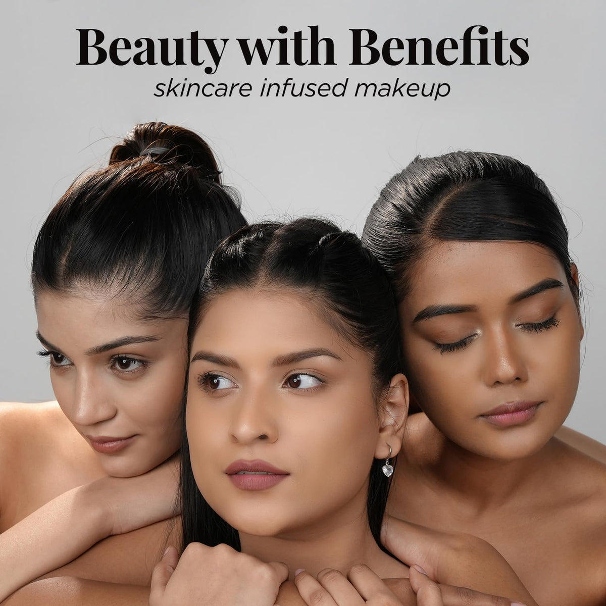 Three women with text 'Beauty with Benefits skincare infused makeup' on a gray background