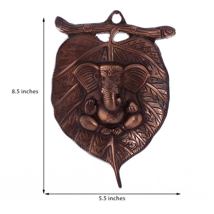 eCraftIndia Metal Wall Hanging of Lord Ganesha on Leaf (LxWxH - 5.5INx0.5INx8.5IN)
