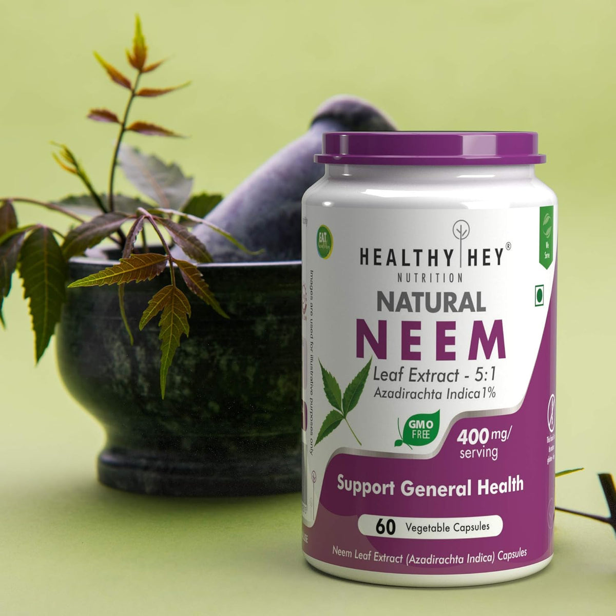 Container of Healthy Hey Natural Neem Leaf Extract with a plant in the background