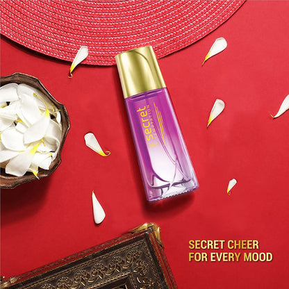 Purple bottle with gold cap on a red background with decorative elements