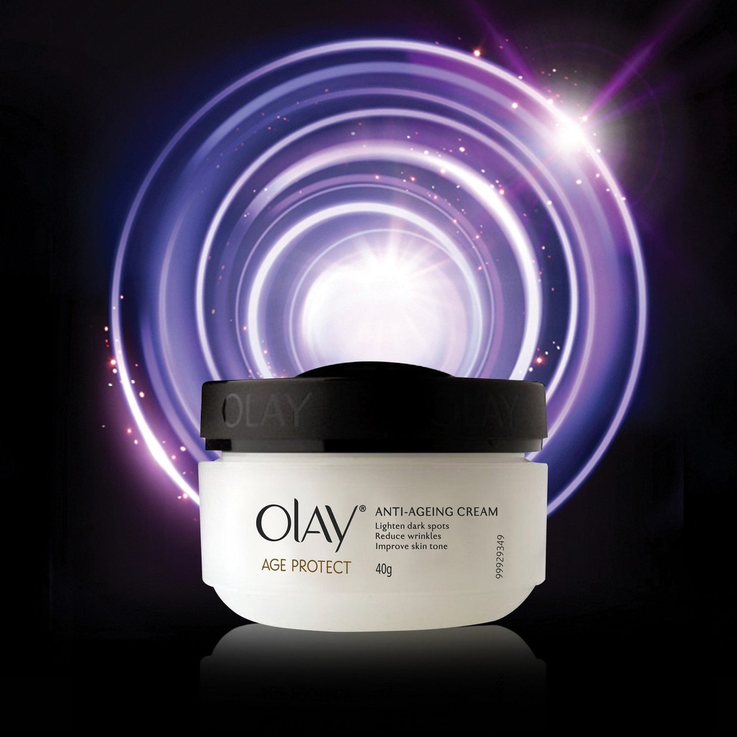 Olay anti-aging cream jar with a black lid on a dark background