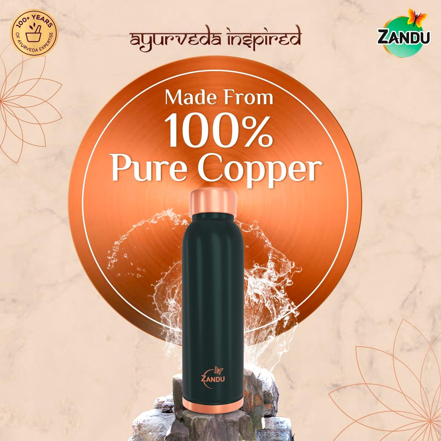 Copper water bottle with ZANDU branding on a decorative background