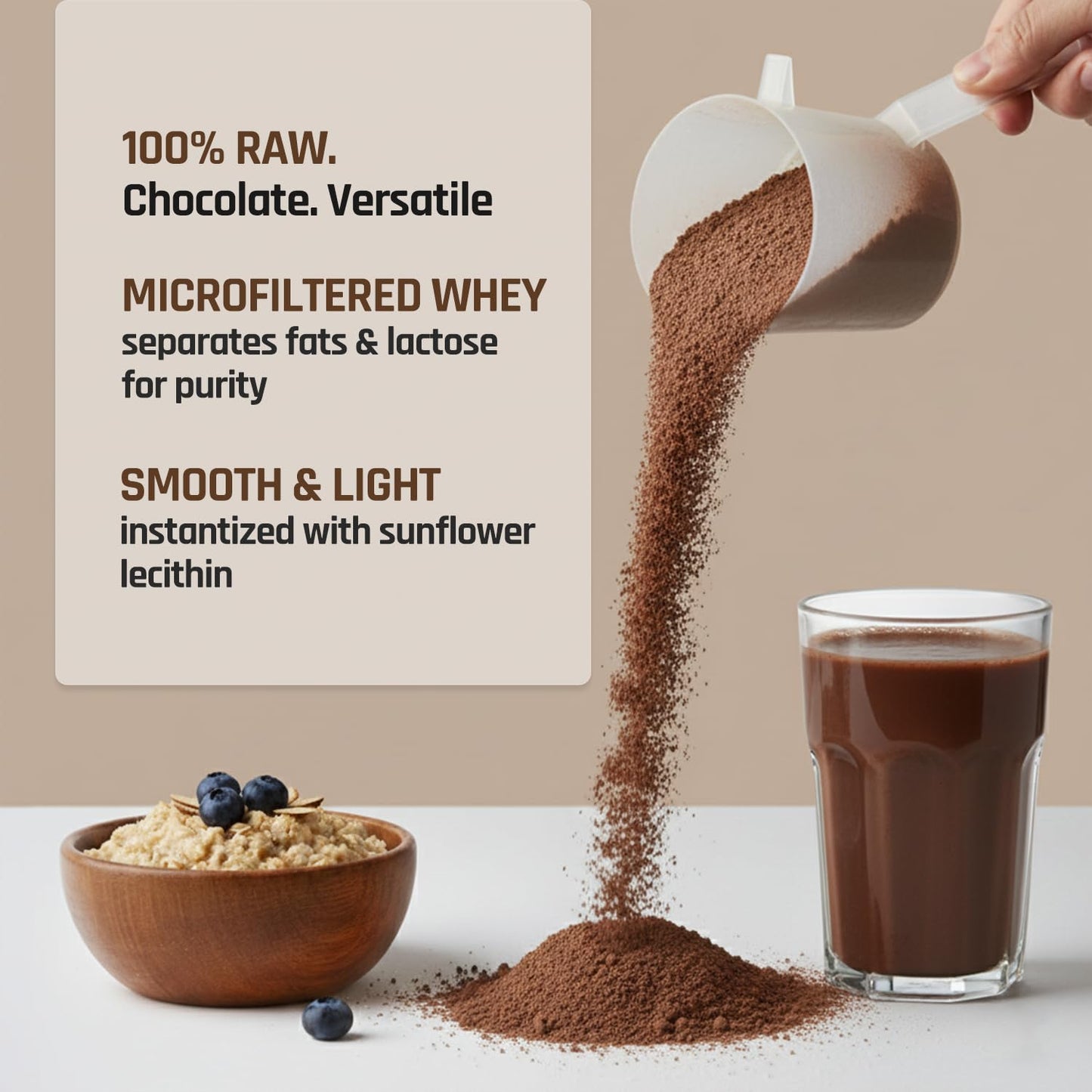 Chocolate powder being poured into a glass with a bowl of cereal and blueberries on a beige background.