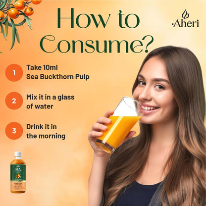 Woman holding a glass of orange juice with sea buckthorn pulp, Aheri brand visible
