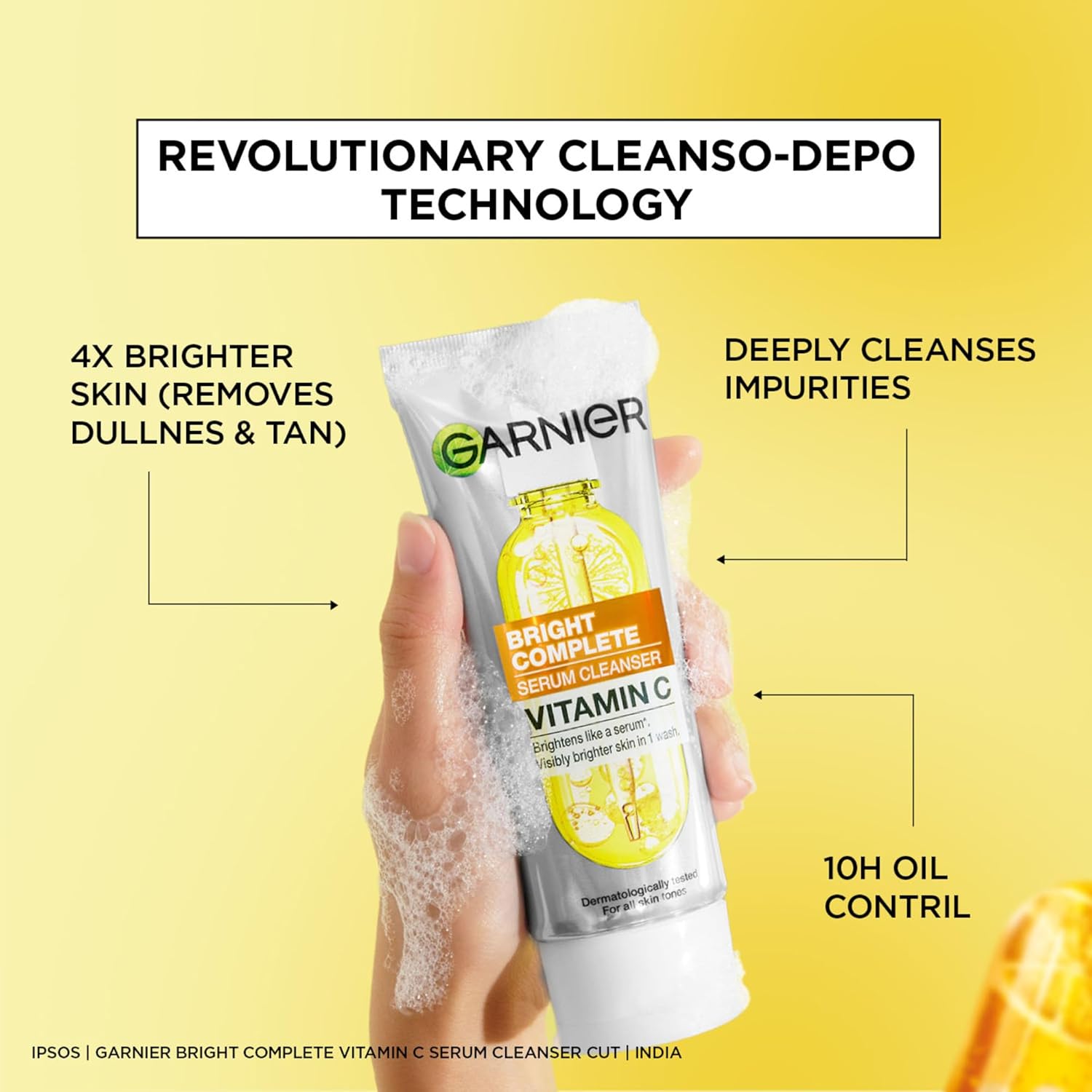 Garnier Bright Complete Vitamin C serum cleanser with text highlighting features on a yellow background