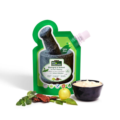 Bio Organic face mask packaging with ingredients on a white background