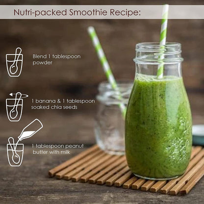 Green smoothie in a glass jar with a straw on a wooden surface, featuring a recipe for a nutri-packed smoothie.