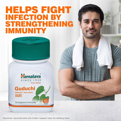 Himalaya Guduchi supplement bottle with a man standing in the background