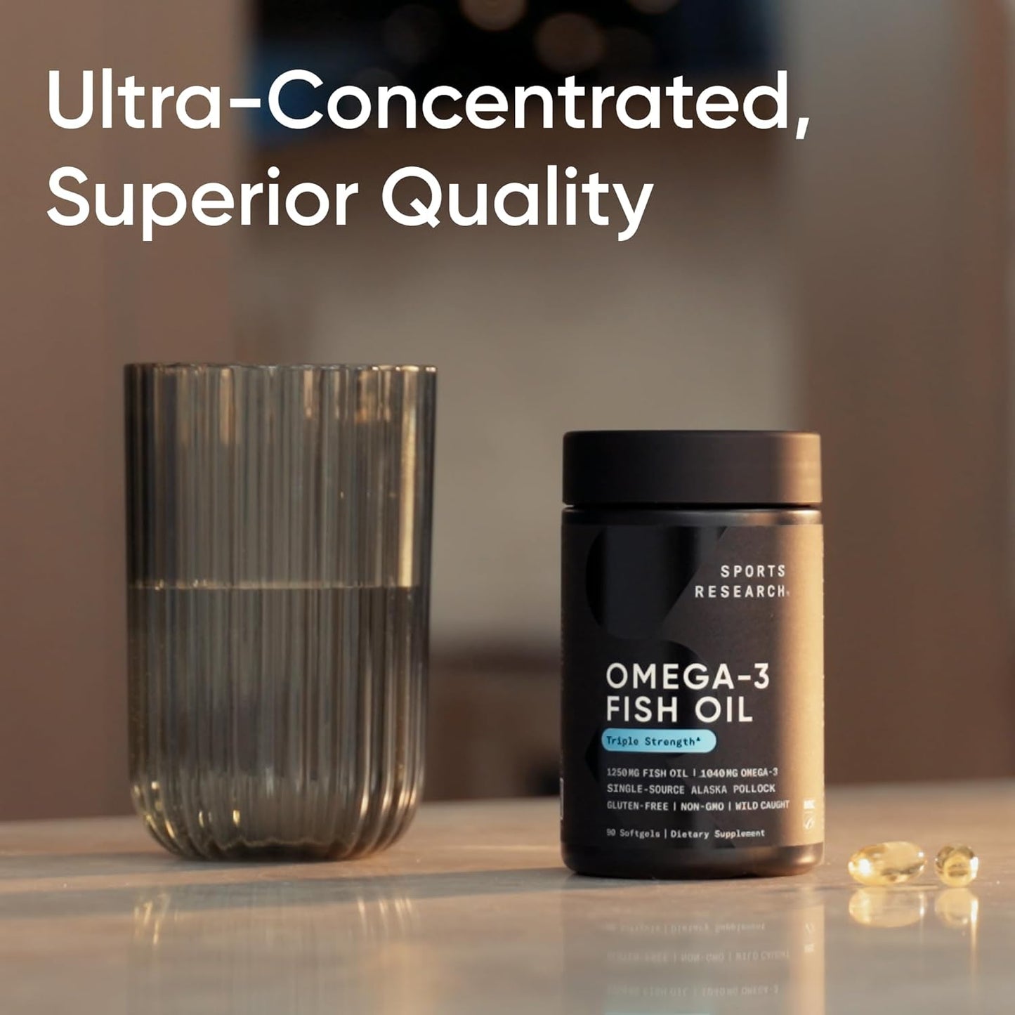 Omega-3 fish oil supplement bottle with a glass on a reflective surface, text 'Ultra-Concentrated, Superior Quality'.