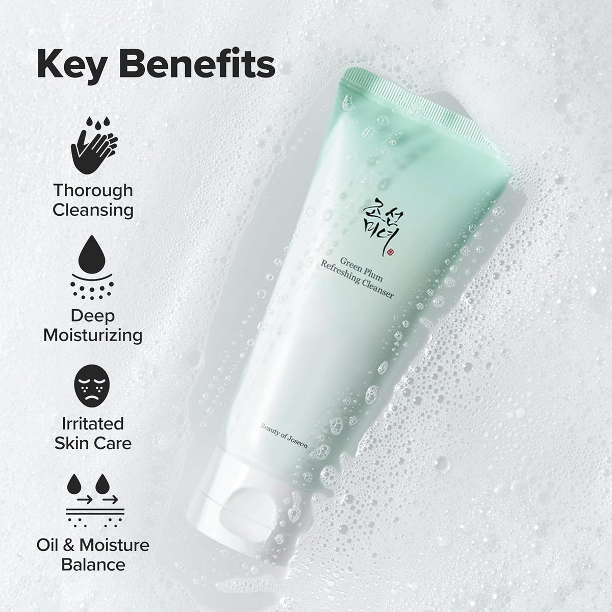 Green skincare cleanser tube with key benefits listed on a textured background