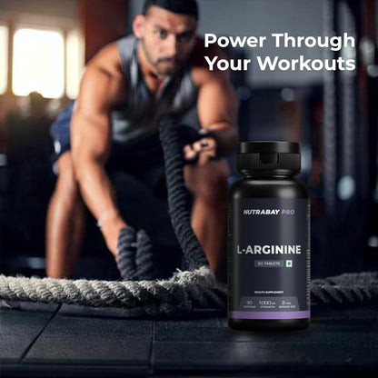 Person using battle ropes with a bottle of Nutrabay Pro L-Arginine in the foreground.