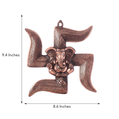 eCraftIndia Lord Ganesha on Swastik Metal Wall Hanging (22 cm x 3 cm x 24 cm, Brown)