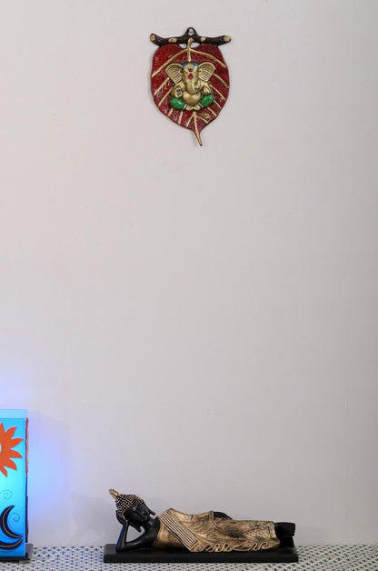 eCraftIndia Lord Ganesha in Green Dhoti on Red Leaf Wall Hanging