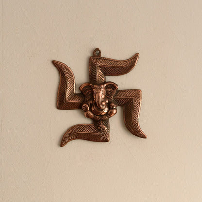 eCraftIndia Lord Ganesha on Swastik Metal Wall Hanging (22 cm x 3 cm x 24 cm, Brown)