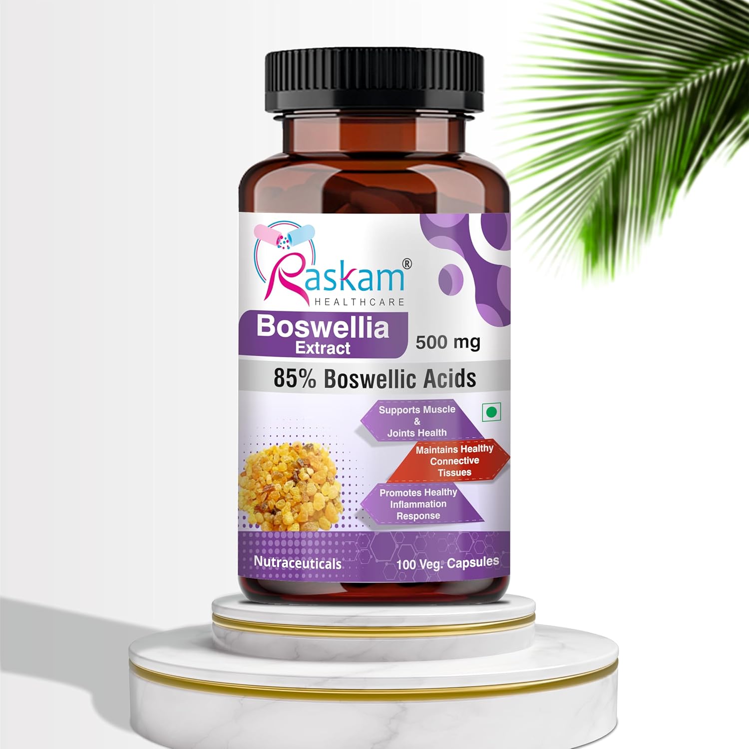 Bottle of Raskam Boswellia Extract on a white background with a palm leaf