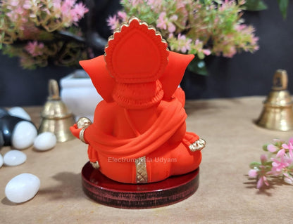 Handcrafted Poly Resin Ganesha Statue with Base - Perfect for Car Dashboard, Office Desk, Shelves, and Home Decor - Ideal Housewarming Gift! (GaddiOrangewithbase)