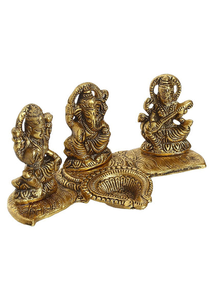 Golden Metal Handcrafted Lakshmi Ganesha Saraswati Idols with Diya On Leaf Chowki - Auspicious Decorative Idols & Diyas for Puja Room, Home, Office, Temple - Gift for Diwali, Housewarming