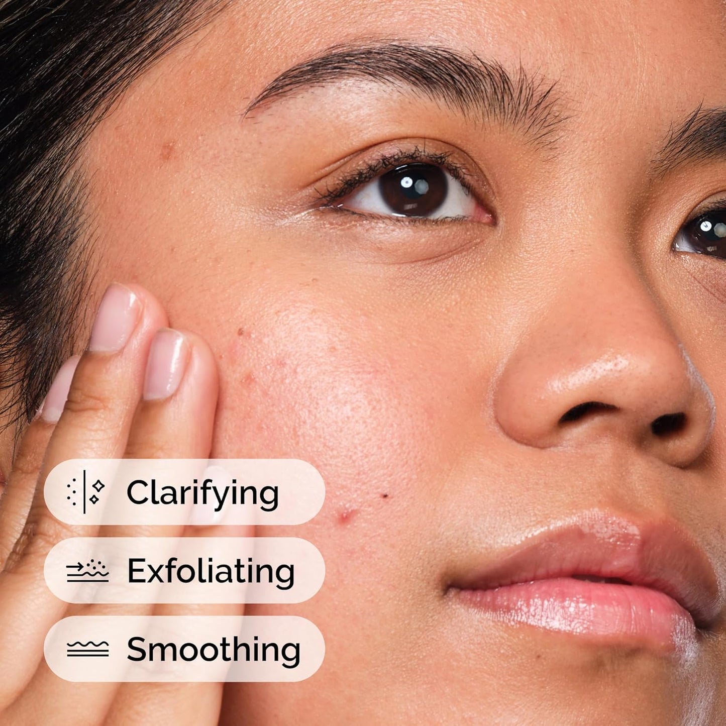 Close-up of a person's face with text indicating 'Clarifying', 'Exfoliating', and 'Smoothing' benefits.