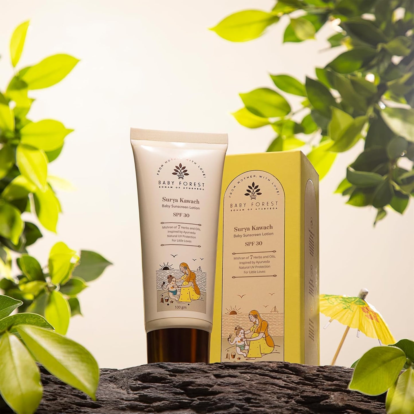 Baby Forest sunscreen tube and box with green leaves in the background