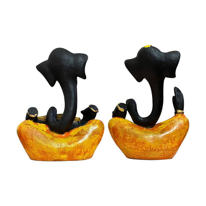Beautiful Resin hawa Ganesha Statues for Home Decor (Pack of 2, Black & Yellow Colour)