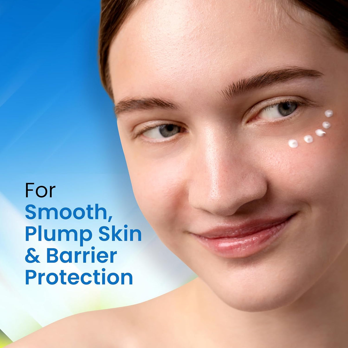 Woman's face with skincare product on cheek against a blue gradient background