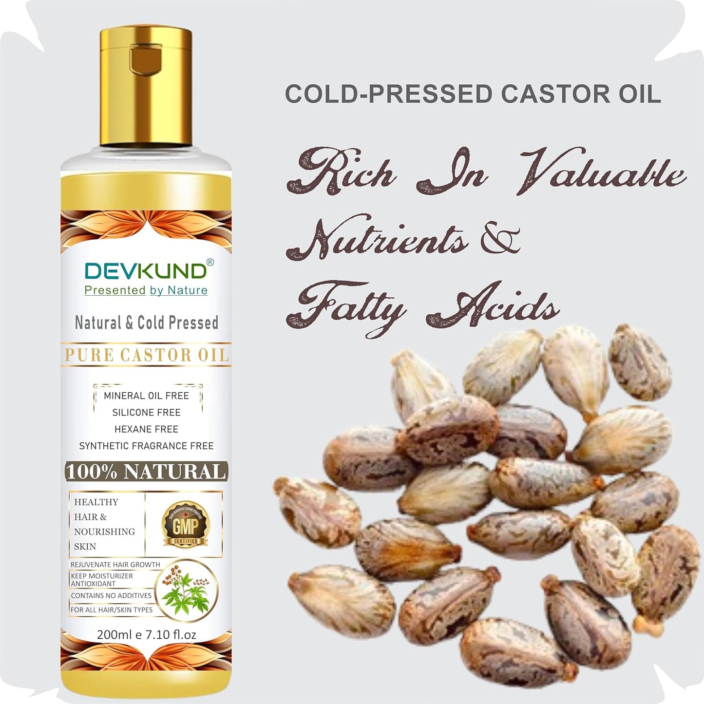 Devkund cold-pressed castor oil bottle with castor seeds on a white background