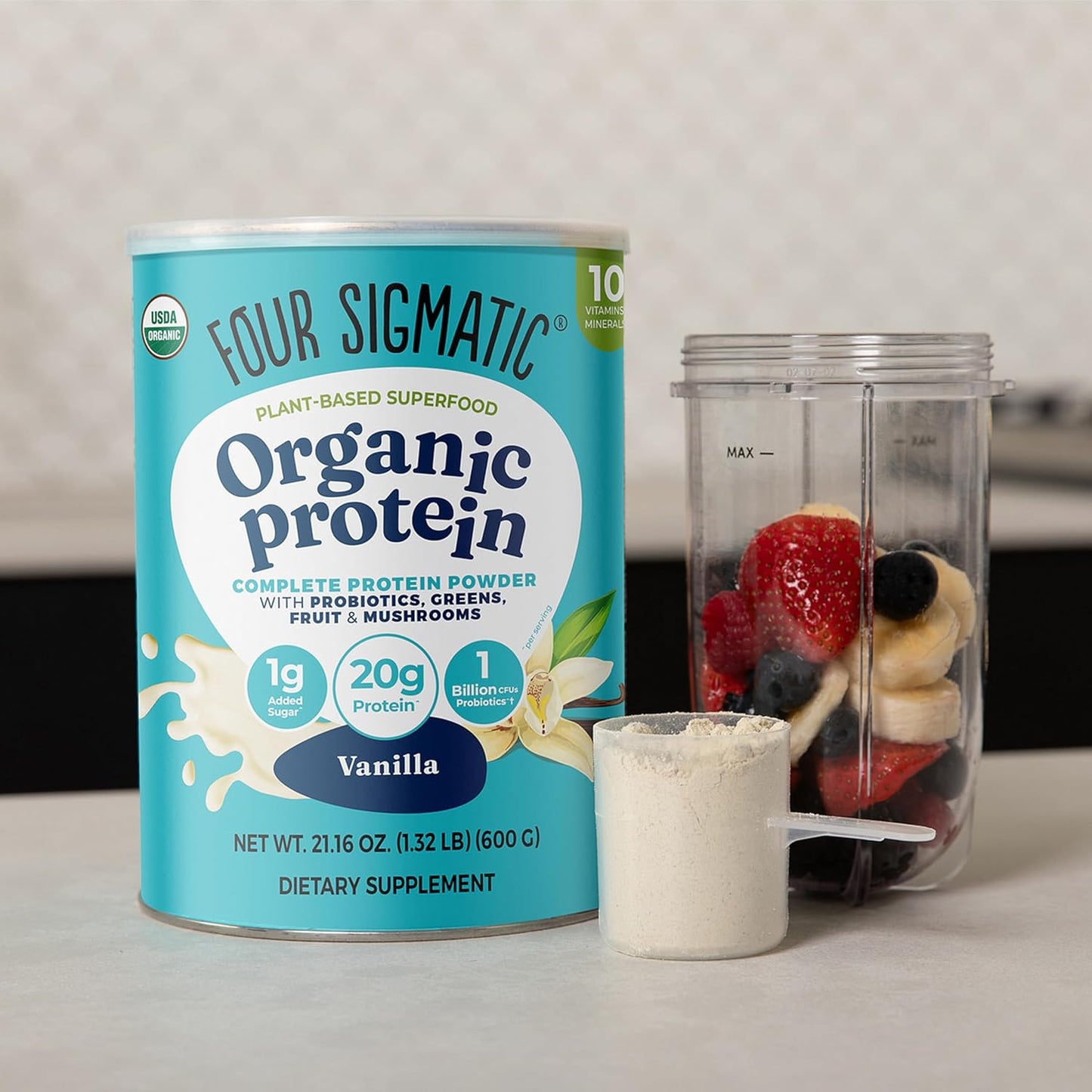 Four Sigmatic Organic Protein canister with a blender filled with fruits on a light background