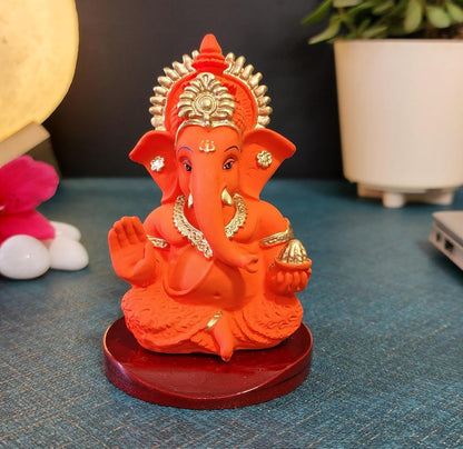 Handcrafted Poly Resin Ganesha Statue with Base - Perfect for Car Dashboard, Office Desk, Shelves, and Home Decor - Ideal Housewarming Gift! (OrangeMukutwithbase)