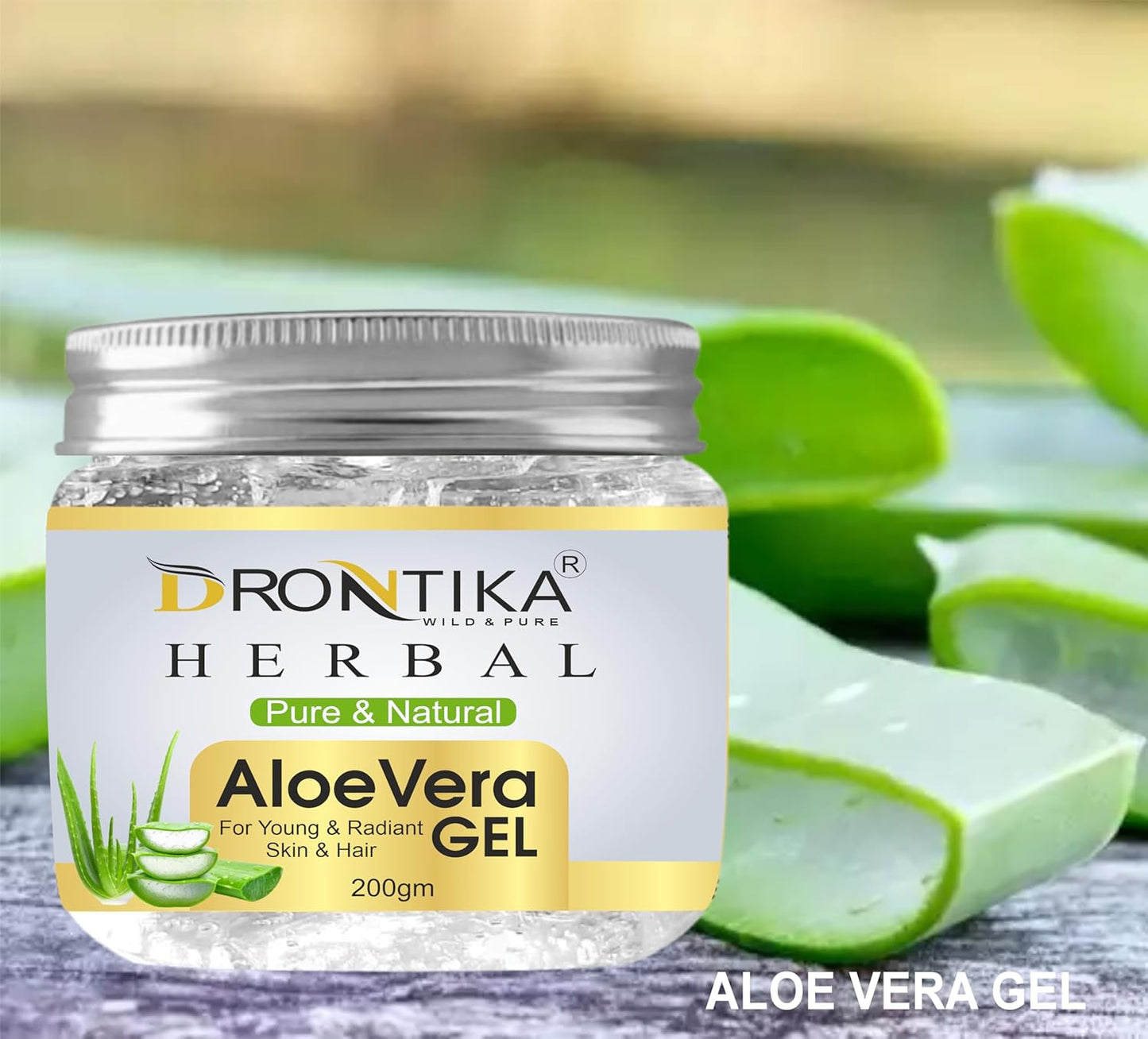 Jar of Drontika Herbal Aloe Vera Gel with aloe vera leaves in the background