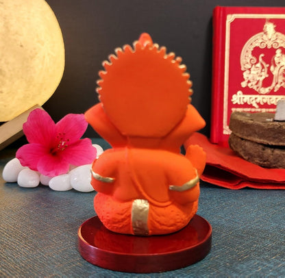 Handcrafted Poly Resin Ganesha Statue with Base - Perfect for Car Dashboard, Office Desk, Shelves, and Home Decor - Ideal Housewarming Gift! (OrangeMukutwithbase)