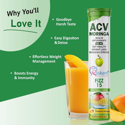 ACV Moringa supplement with a glass of juice and mangoes on a green background