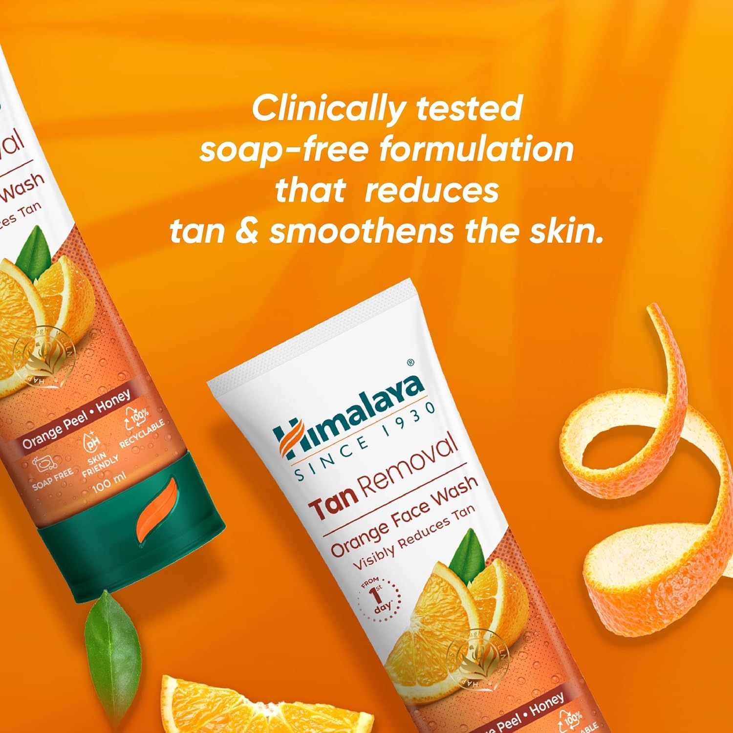 Himalaya Tan Removal Face Wash with orange peel and honey on an orange background