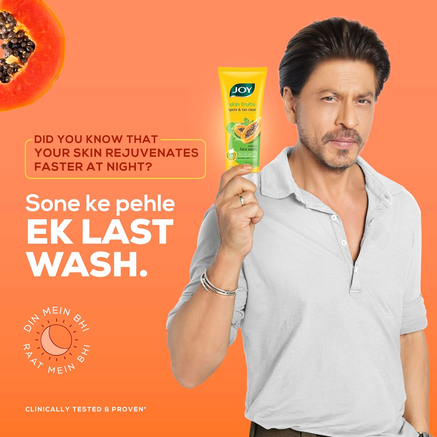 Man holding a tube of Joy soap with text about skin rejuvenation on an orange background