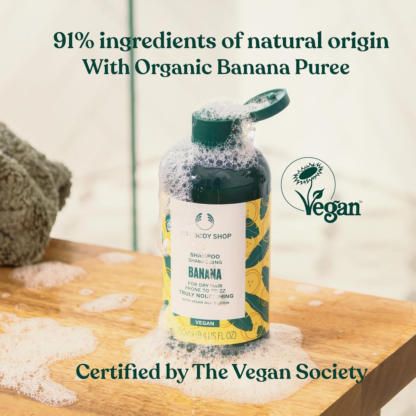 The Body Shop Banana Truly Nourishing Shampoo | Repairs & Smooths Frizz-Prone Hair | Enriched with Organic Banana Puree | Vegetarian | For Nourished & Soft Locks | For Men & Women | 250ml