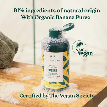The Body Shop Banana Truly Nourishing Shampoo | Repairs & Smooths Frizz-Prone Hair | Enriched with Organic Banana Puree | Vegetarian | For Nourished & Soft Locks | For Men & Women | 250ml