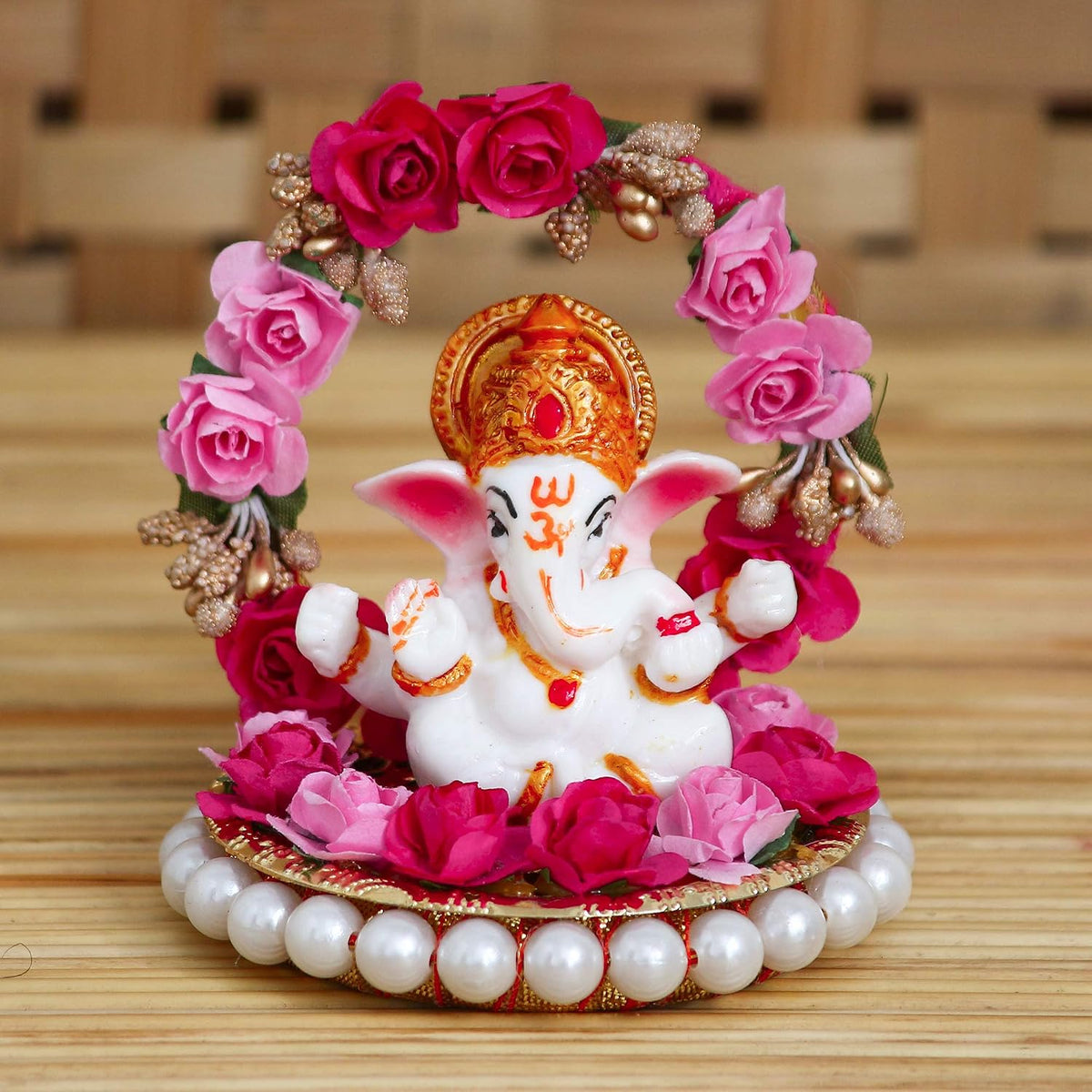 Lord Ganesha Idol on Decorative Handcrafted Plate with Throne of Pink and Red Flowers