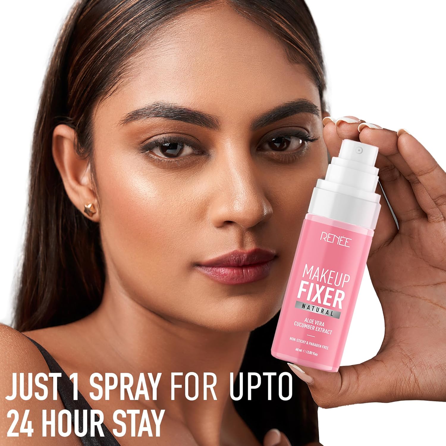 Woman holding a pink makeup fixer spray with text about 24-hour stay.