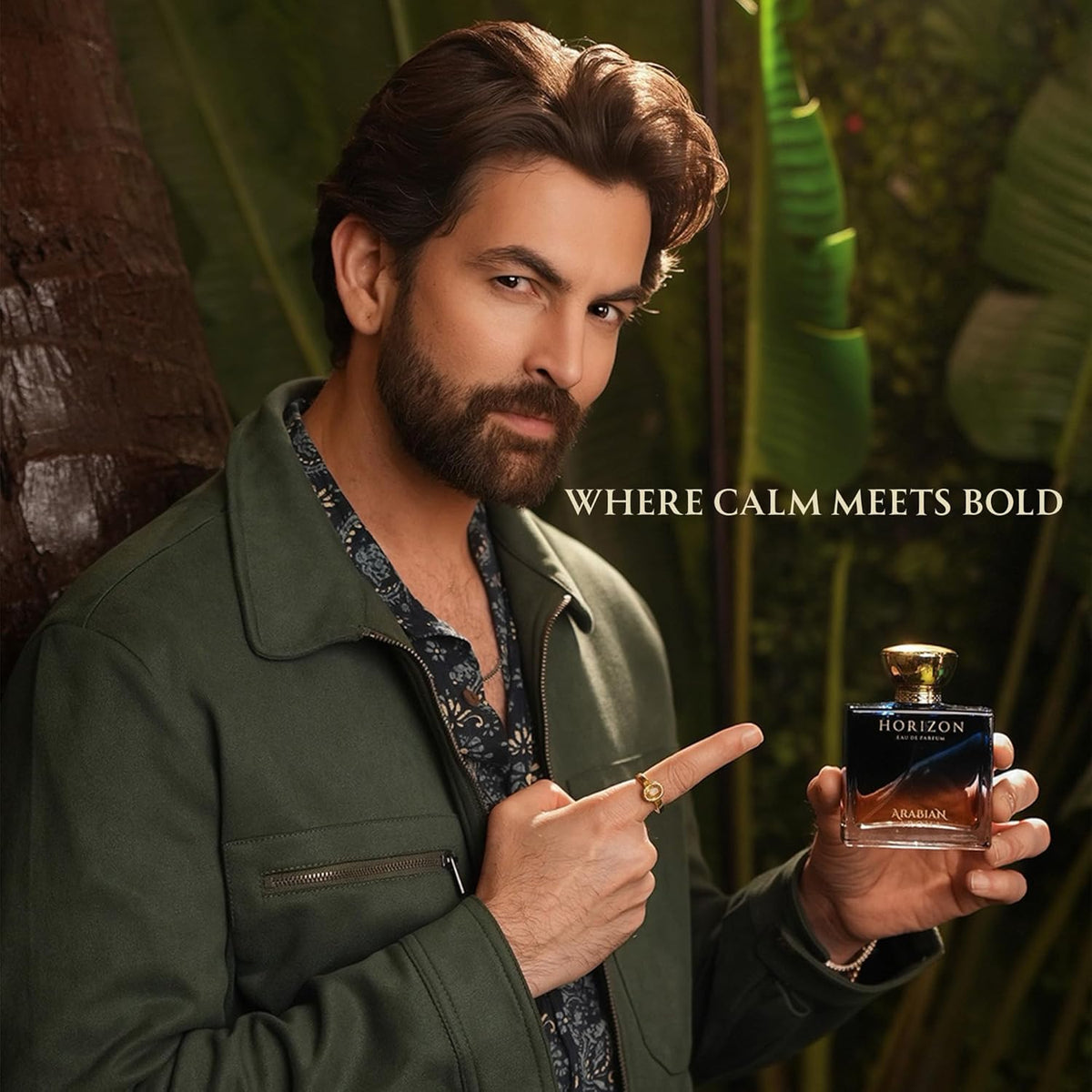Man holding a perfume bottle with text 'Where Calm Meets Bold' in a natural setting