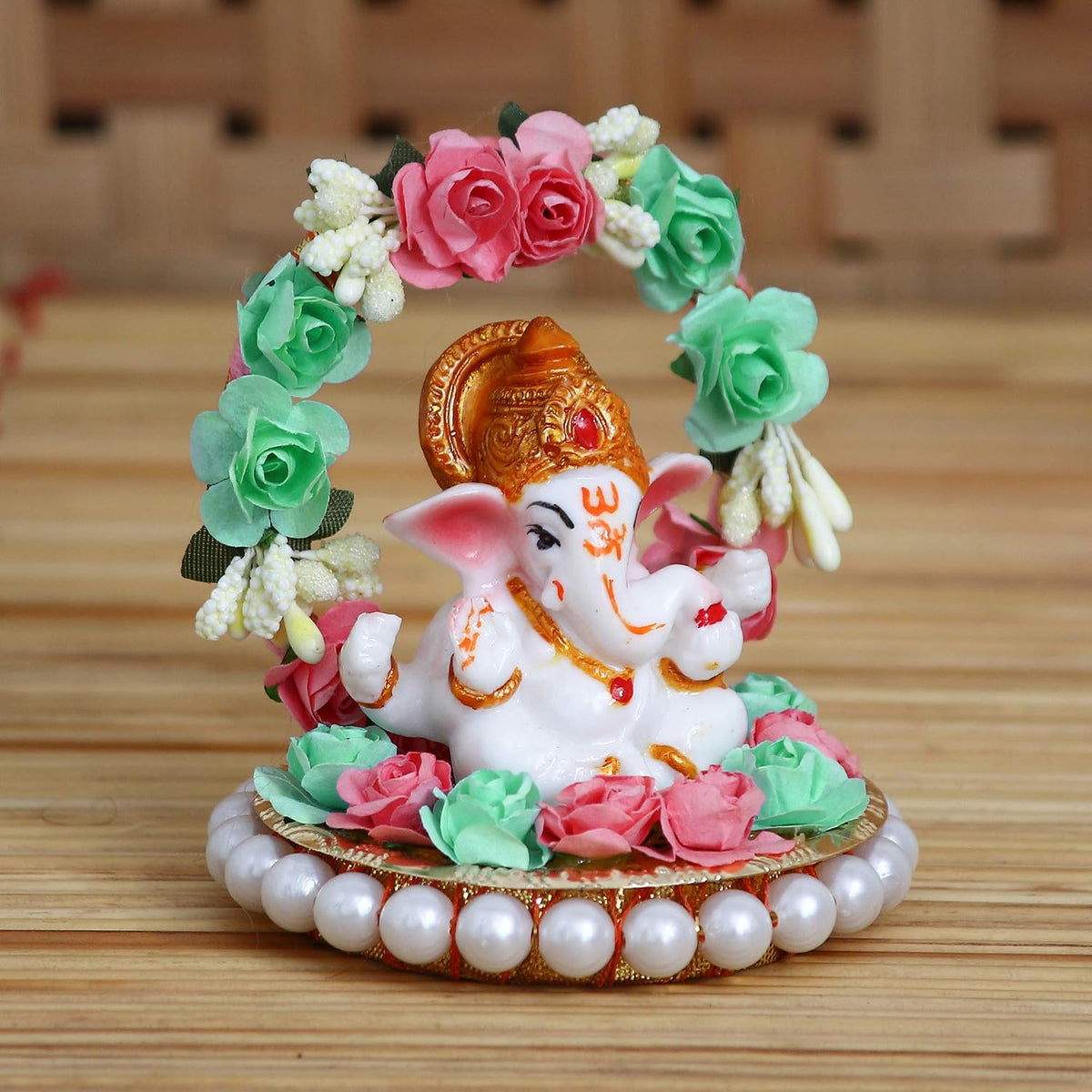 Lord Ganesha Idol on Decorative Handcrafted Plate with Throne of Pink and Green Flowers