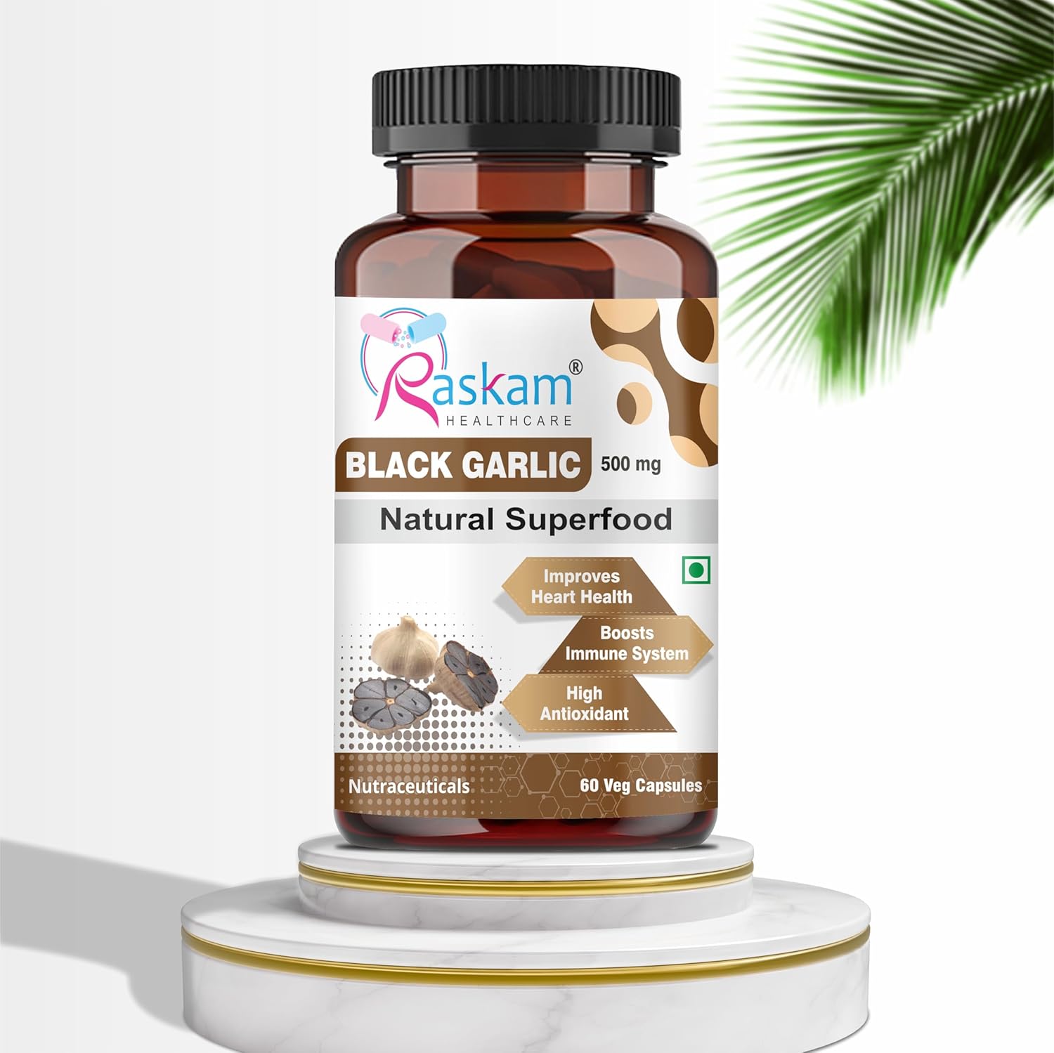 Bottle of Raskam Black Garlic capsules on a white background with a palm leaf.