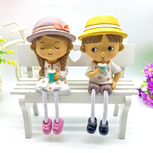 I Love You Heart & Bouquet Gift Set Decorative Showpiece |Gift for him/her or Someone Special | Cute Couple Wearing Caps Hanging Legs - 2 Pcs Set Multicolor