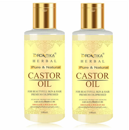 Two bottles of Drontika Herbal Castor Oil on a white background