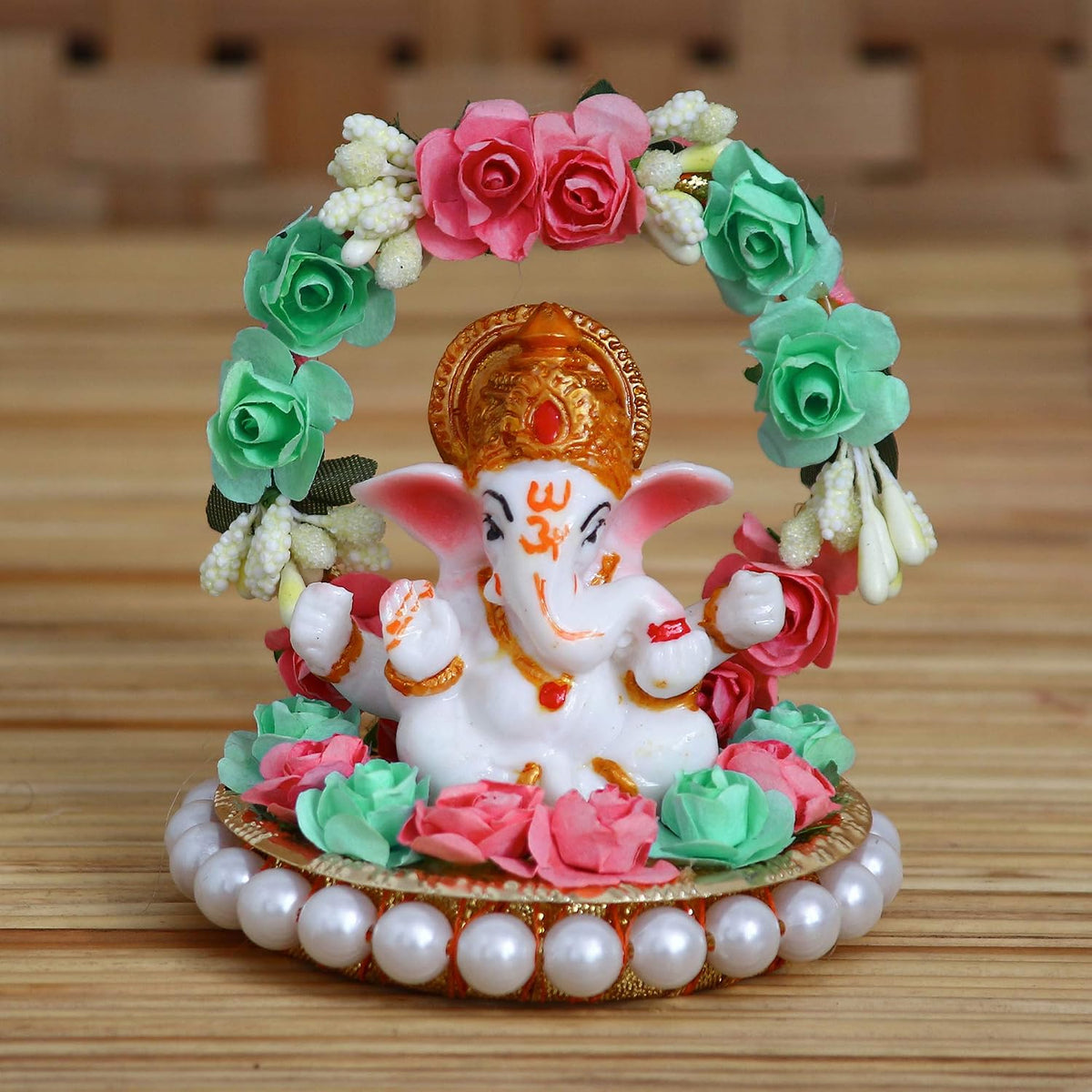 Lord Ganesha Idol on Decorative Handcrafted Plate with Throne of Pink and Green Flowers