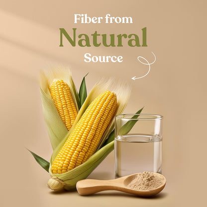 Corn on the cob, glass of water, and wooden spoon with cornmeal on a beige background with text 'Fiber from Natural Source'.