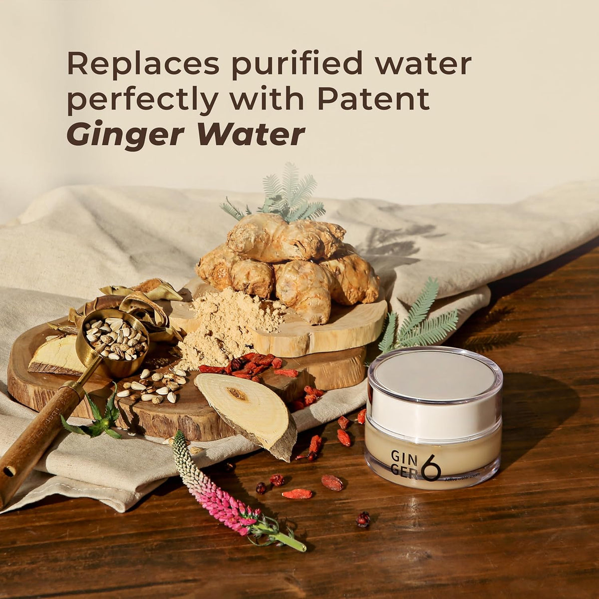 Ginger water product with ingredients on a wooden surface