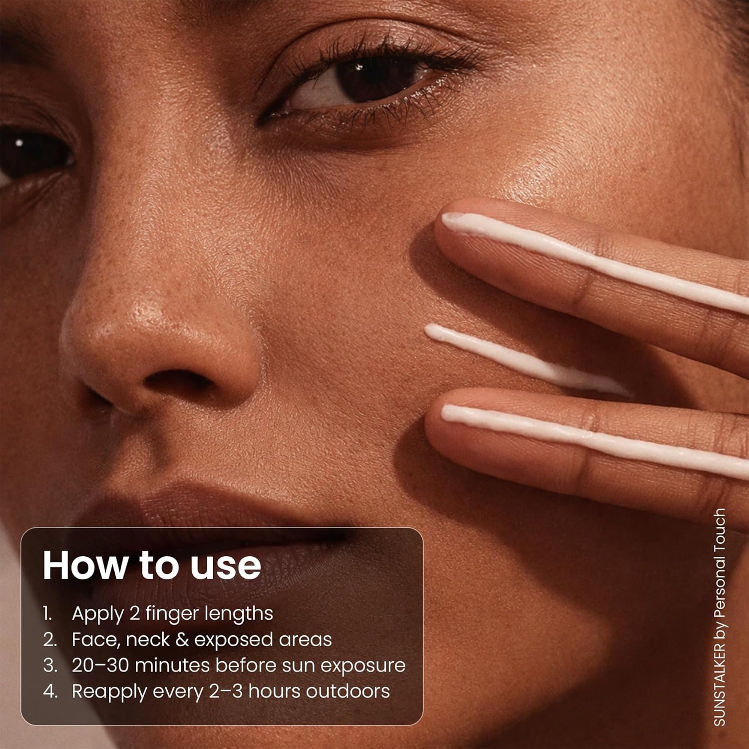 Close-up of a person applying sunscreen with text on how to use it.