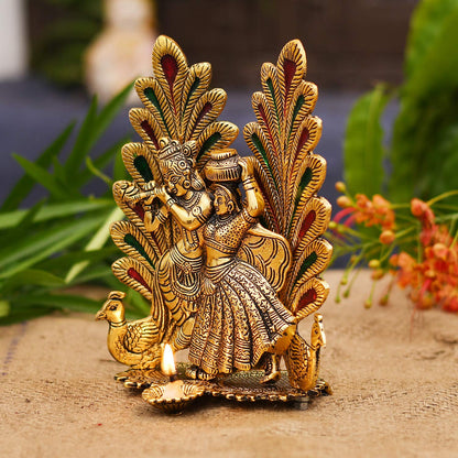 Collectible India Peacock Design Radha Krishna Idol Showpiece with Diya for Puja and Home Decor (7 x 5 Inches), Metal, Gold (1 Piece)