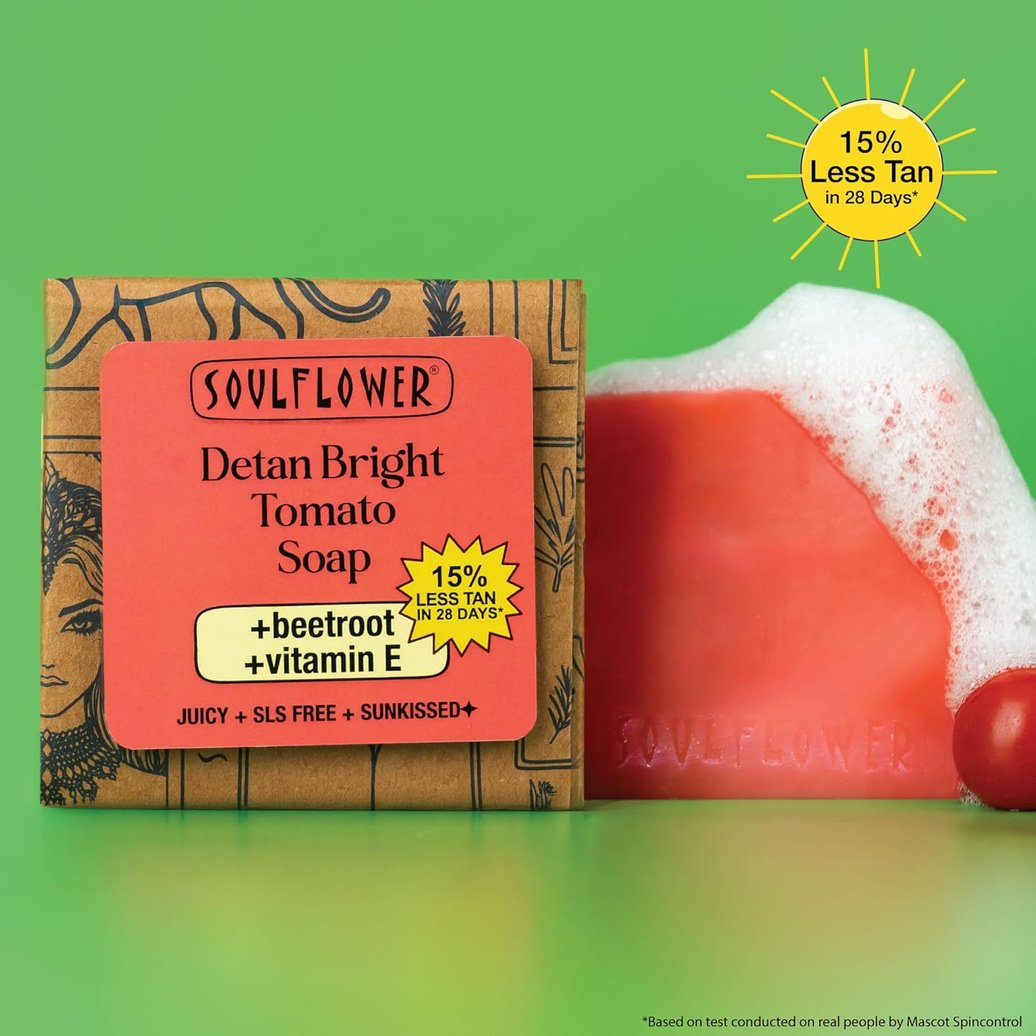 Soulflower Detan Bright Tomato Soap with packaging on a green background